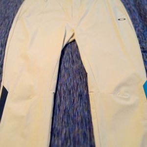 OAKLEY nylon pants. Size 38 waist. Cream color very comfortable like new.